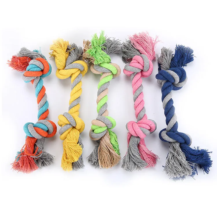 Cotton rope dog toy in medium size with braided texture, available in green, light blue, navy blue, pink, and yellow