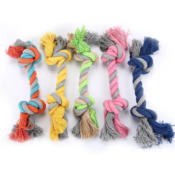 Cotton rope dog toy in medium size with braided texture, available in green, light blue, navy blue, pink, and yellow
