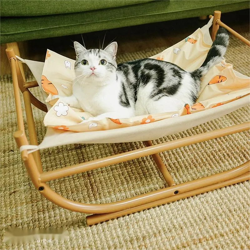 Iron cat hammock pet sofa bed in milk tea colour on a white background, semicircle design