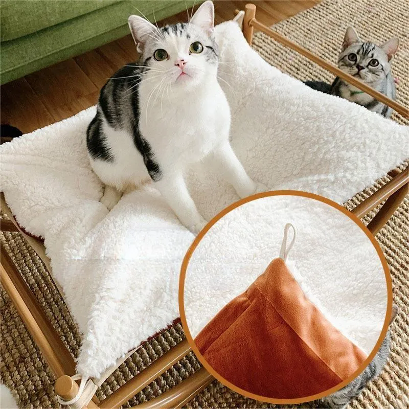 Iron cat hammock pet sofa bed in milk tea colour on a white background, semicircle design