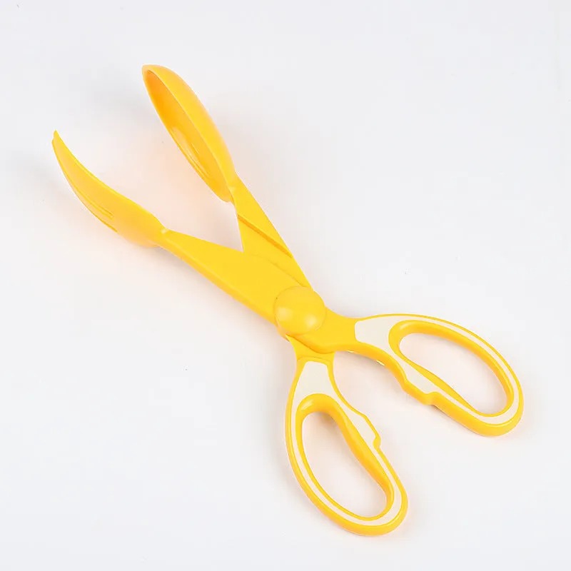 Pet poop clip with long handle tongs in yellow picking up dog waste from grass, 30x10x4cm PVC tool