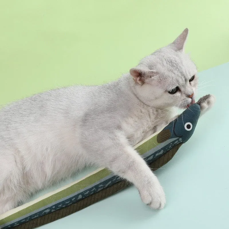 Canvas cat toy shaped like a mint fish in green eel colour on a light background