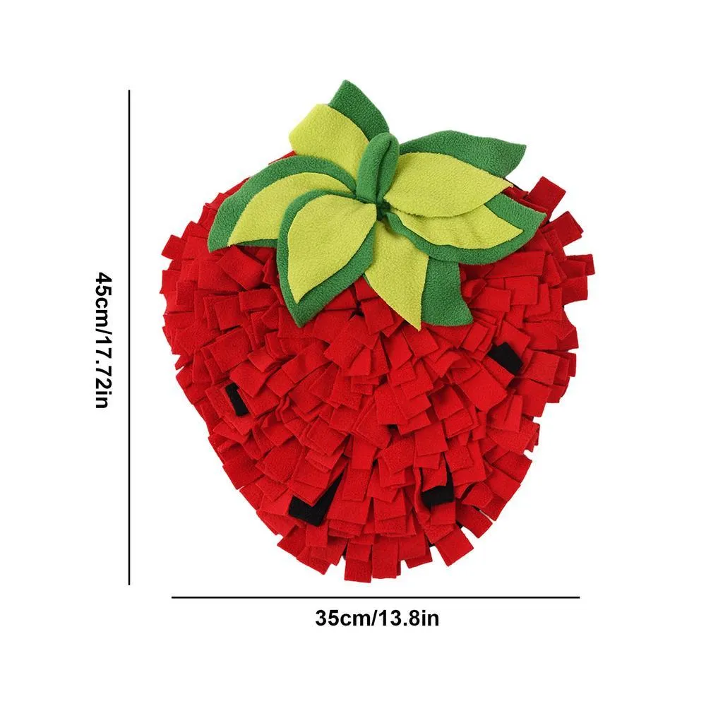 Red and green strawberry shaped pet slow feeder mat for dogs and cats on floor