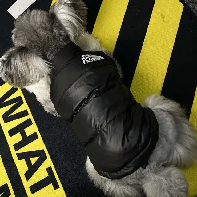 Thick warm down vest for dogs in black, showing side view, sizes S to XXL