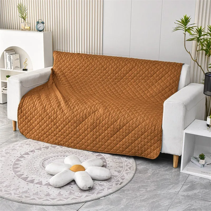 Reversible waterproof dog blanket sofa cover in grey, laid flat on a sofa