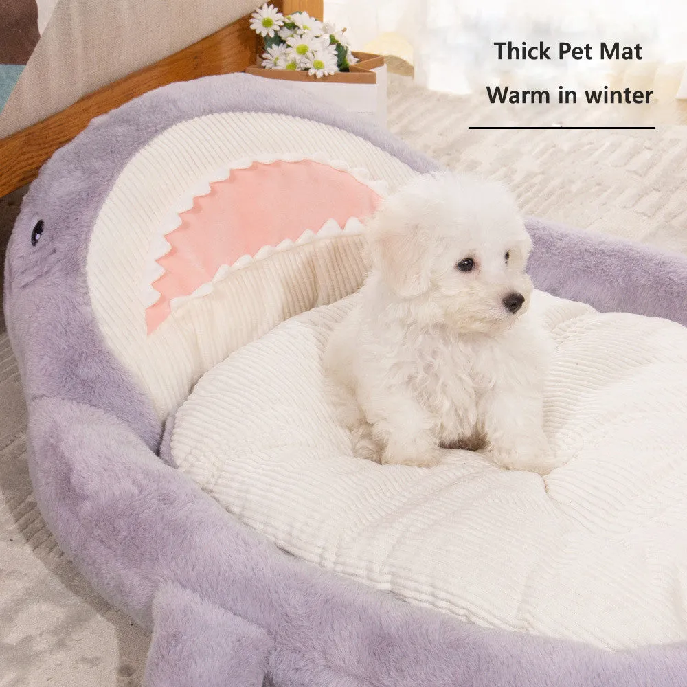 Blue shark pattern pet bed cushion for dogs and cats on a wooden floor
