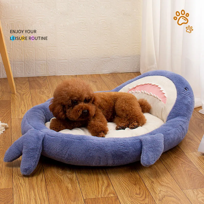Blue shark pattern pet bed cushion for dogs and cats on a wooden floor