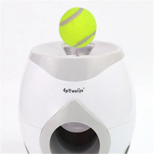 White plastic tennis food reward machine for interactive dog training with snack dispensing