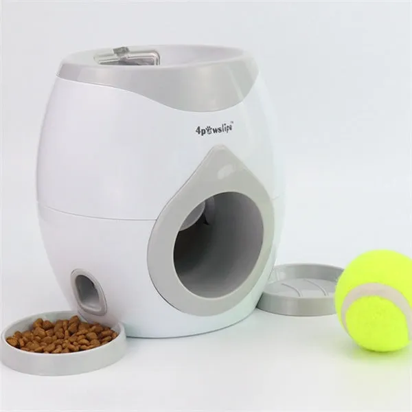 White plastic tennis food reward machine for interactive dog training with snack dispensing