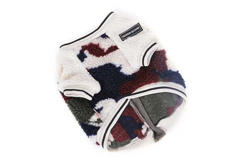Camouflage dog hooded coat with two-legged design on a dog, showing hood and waterproof fabric