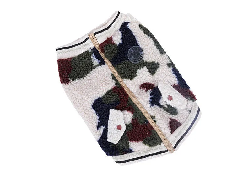 Camouflage dog hooded coat with two-legged design on a dog, showing hood and waterproof fabric