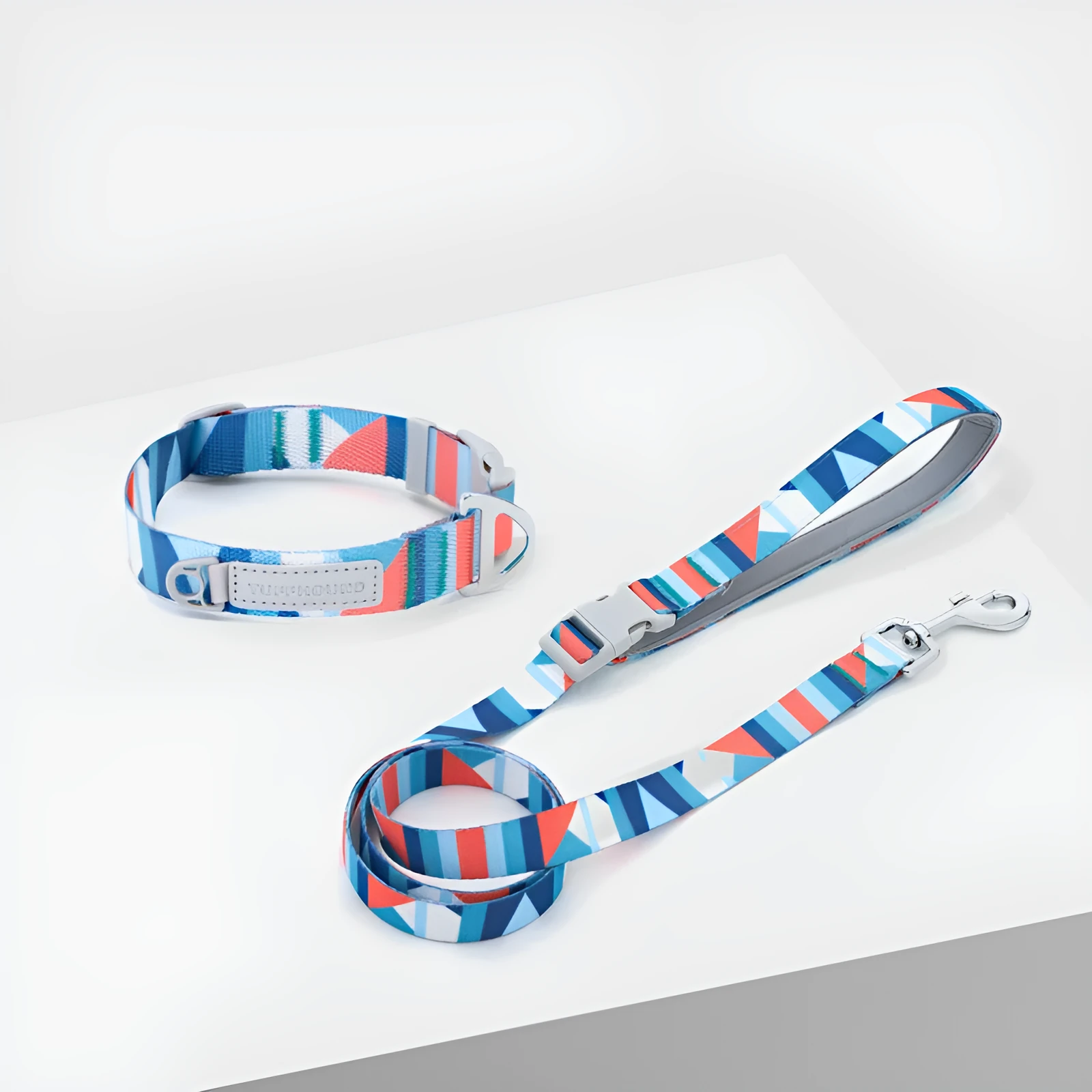 Blue nylon dog traction belt with 120cm lead and adjustable neck loop on a white background