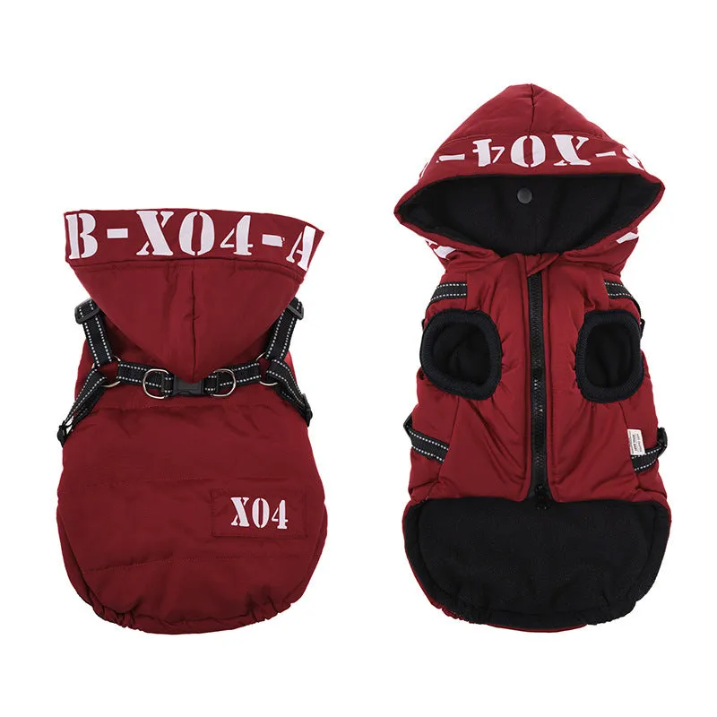 Red fleece-lined waterproof dog winter jacket with hood on medium-sized dog