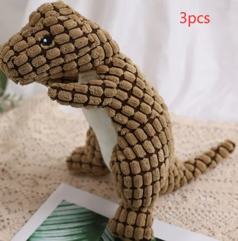Dog bite resistant plush sounding toy dinosaur in corn wool, orange colour, 29x14cm