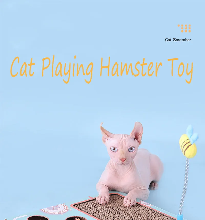Blue cat toy teaser whack-a-mole game on floor, 36x26x6cm, cardboard and wood construction.