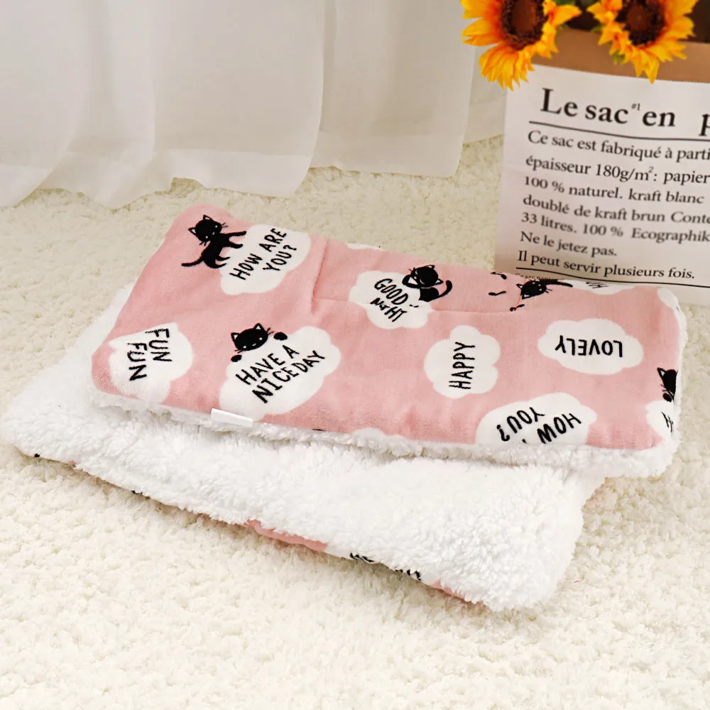 Lambskin pet blanket in flannel cashmere with cute cartoon pattern, grey colour, 55x70cm size on a pet bed