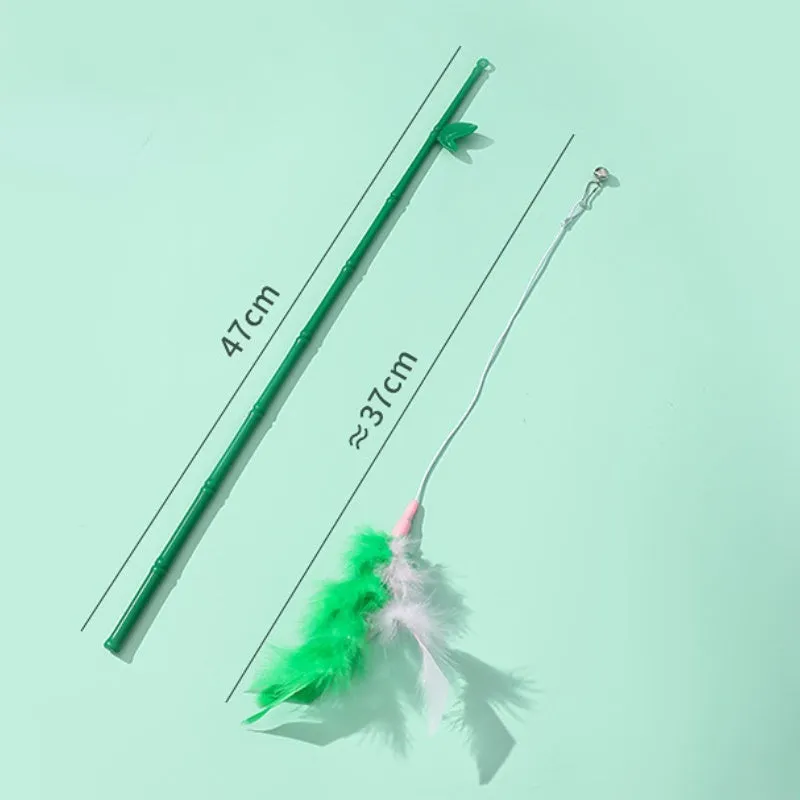 Green interactive cat wand toy with feather and bell attachments for stimulating play