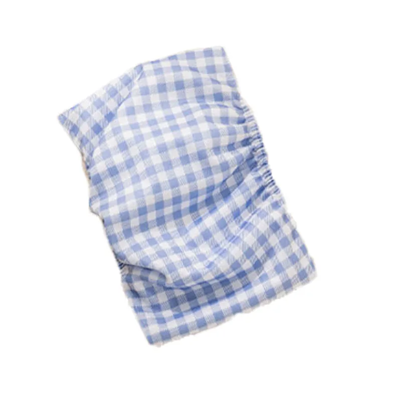 Reusable male dog diaper belly band with cartoon bone paw print design and fastener tape.