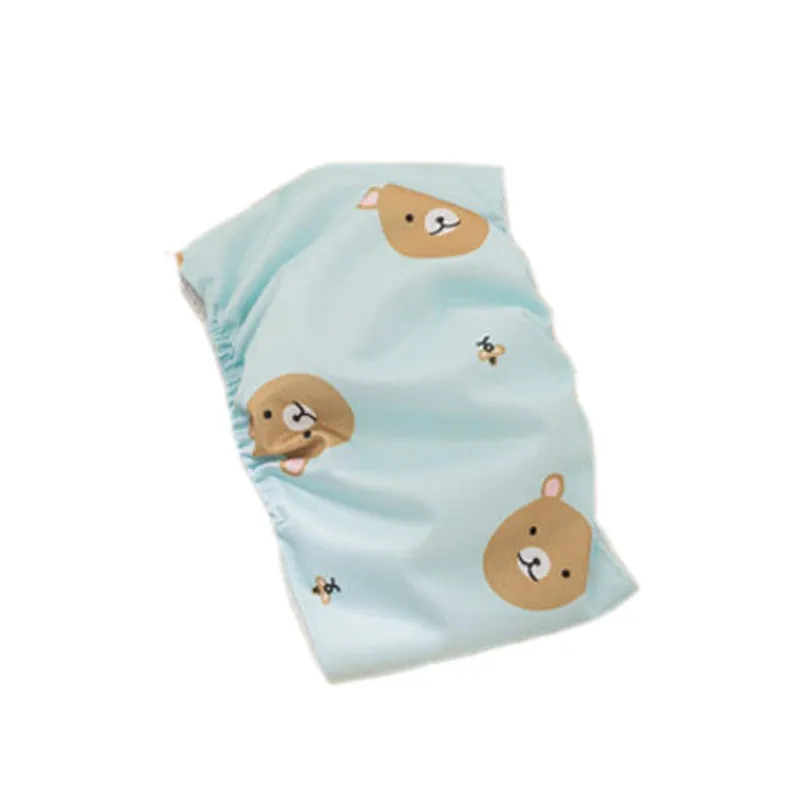 Reusable male dog diaper belly band with cartoon bone paw print design and fastener tape.
