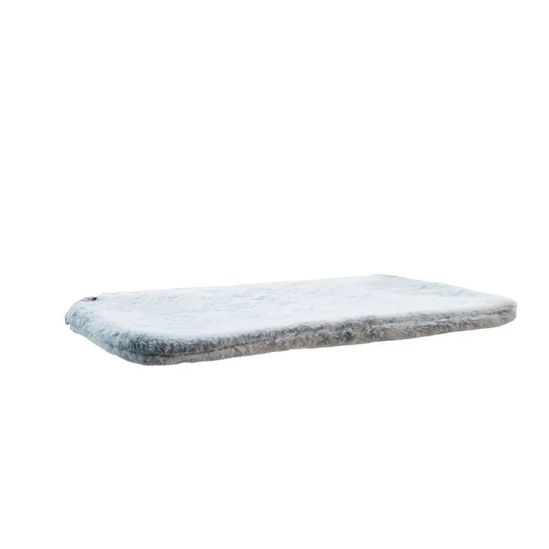 Cat hammock with suction cups attached to a window, beige mesh fabric and stainless steel frame