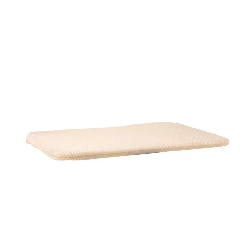 Cat hammock with suction cups attached to a window, beige mesh fabric and stainless steel frame