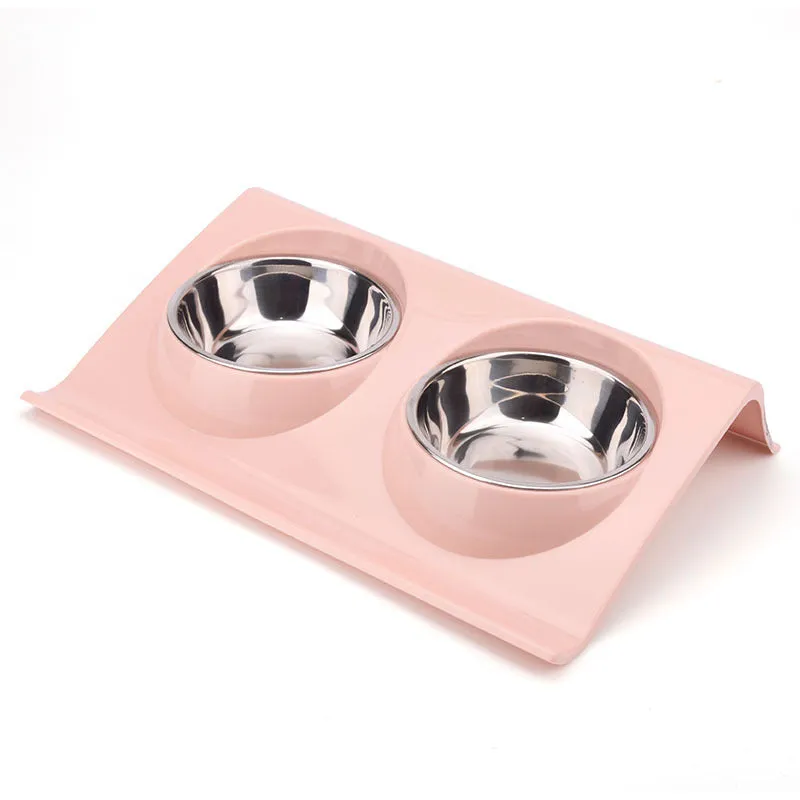 Stainless steel pet double bowl with green PP base and metal inner bowl on floor