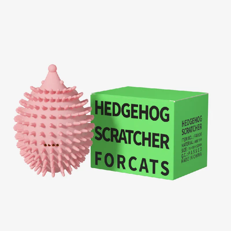 Green cat corner scratcher with plastic base and long teaser stick on a light background