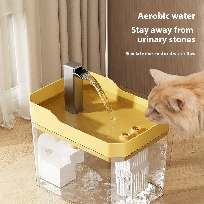 Automatic cat water fountain with filter in transparent plastic, showing water flow.