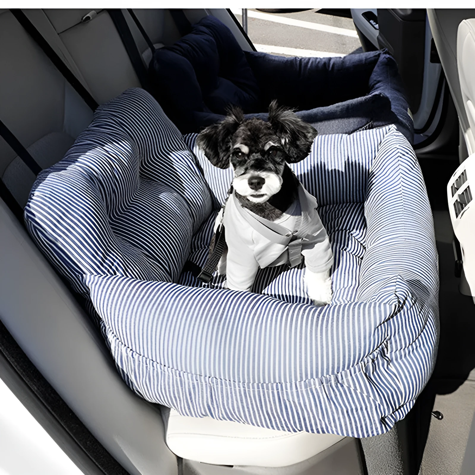 Canvas pet car seat cushion in striped pattern, set on a car seat with raised sides