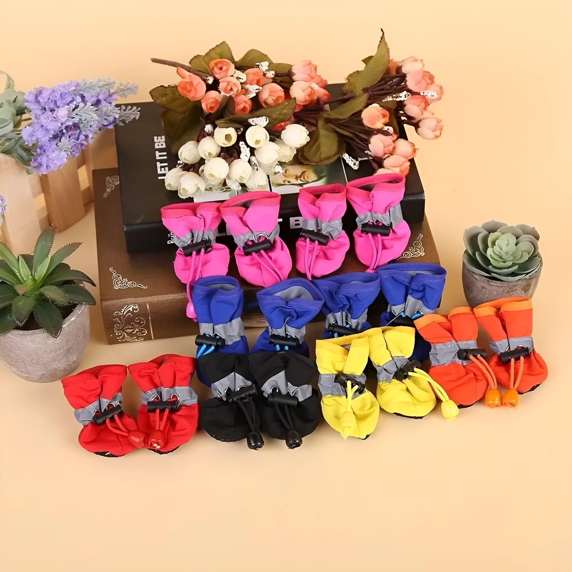 Set of four cloth dog shoes with soft soles in various colour options including fleece-lined variants