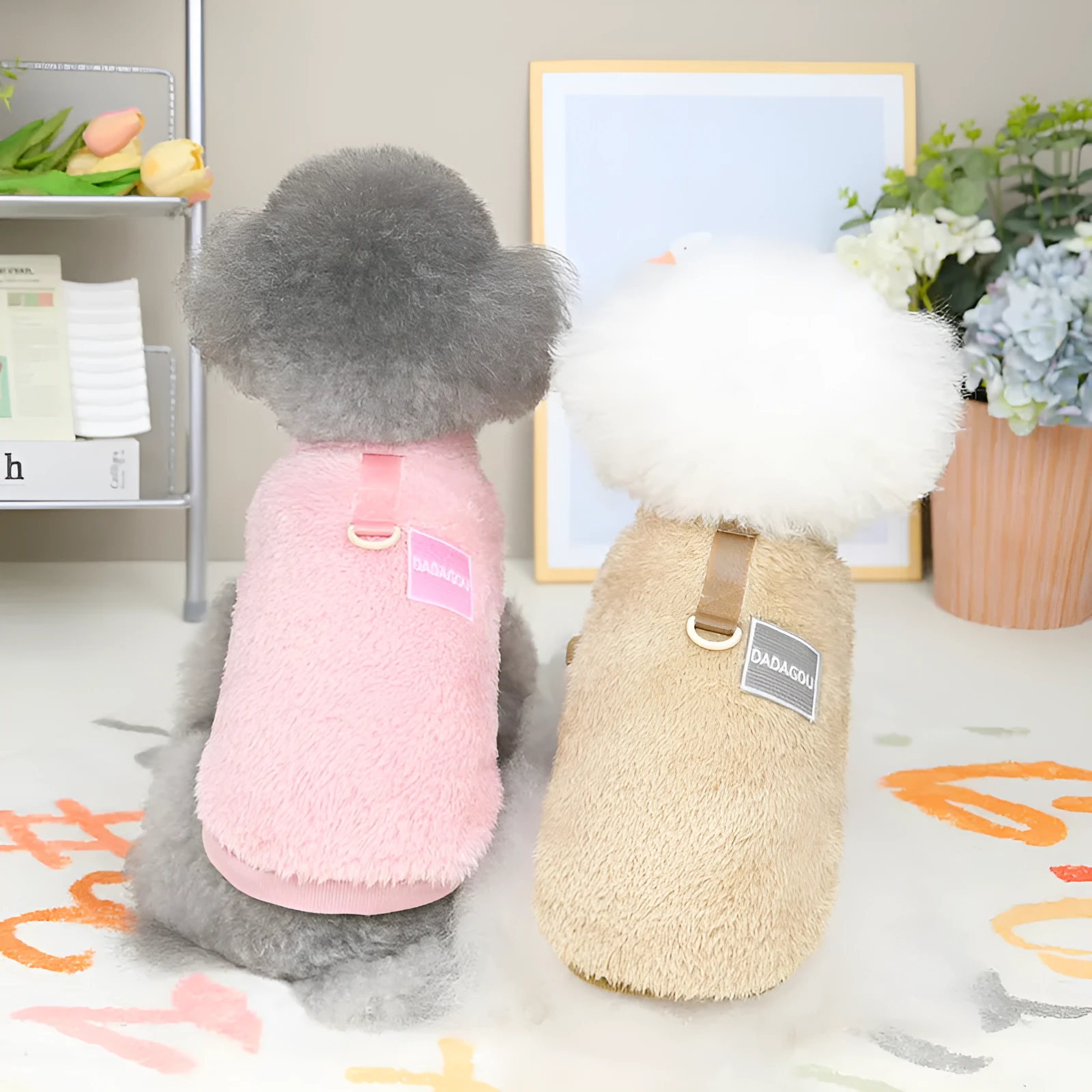 A soft coral fleece dog jacket shown in blue, available in sizes S to XXL.