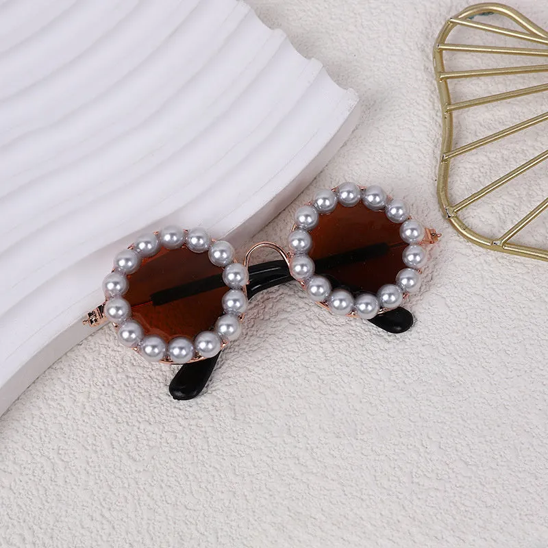 Pearl-rimmed round sunglasses for cats and dogs in multiple colours and sizes