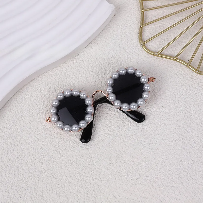 Pearl-rimmed round sunglasses for cats and dogs in multiple colours and sizes