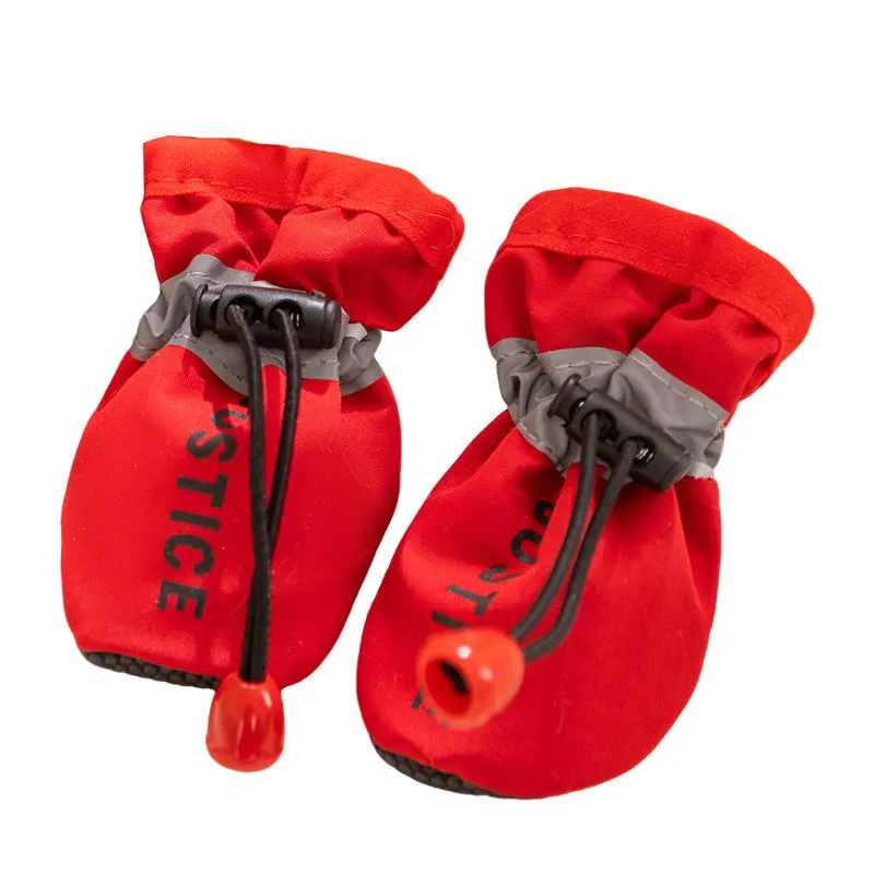 Fleece dog shoes for small dogs, black with golden Power print, soft sole, drawstring lock, on a white background