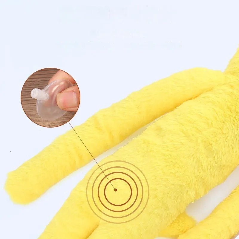 Large pink and yellow plush dog toy with interactive rattle and crinkle paper sound features