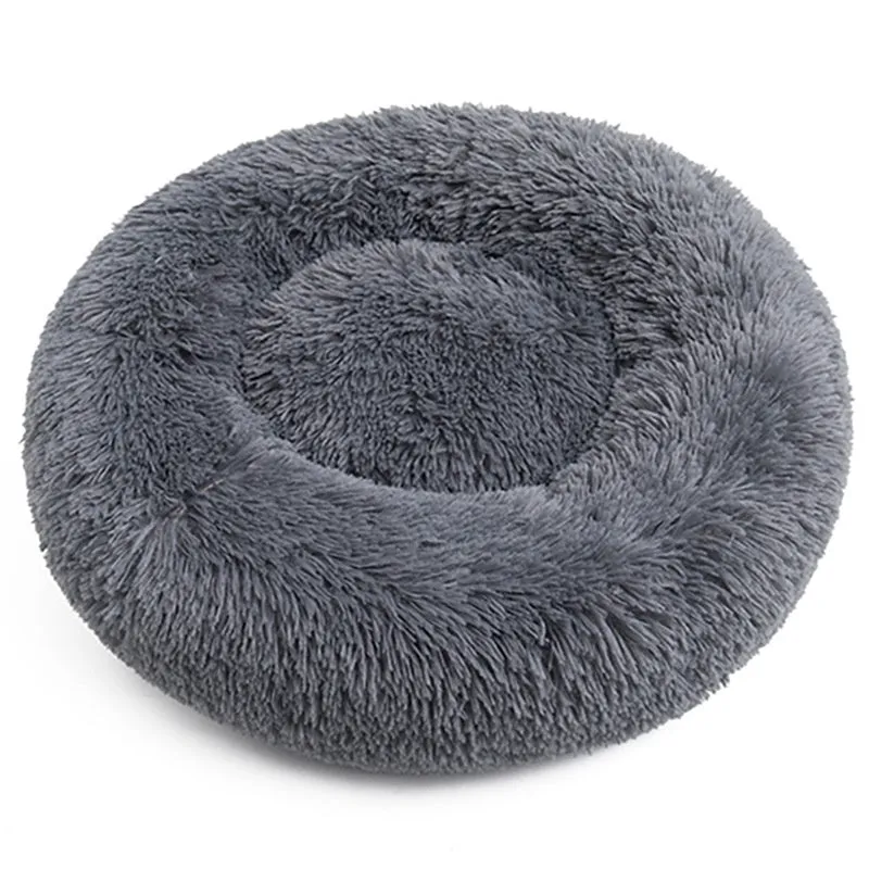 Plush fabric pet bed in round shape for dogs and cats multiple sizes and colours