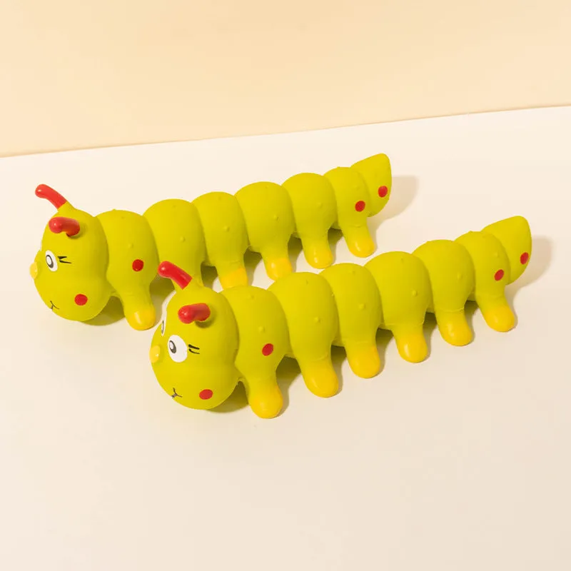 Yellow rubber caterpillar-shaped dog toy with squeaker measuring 25.5cm long