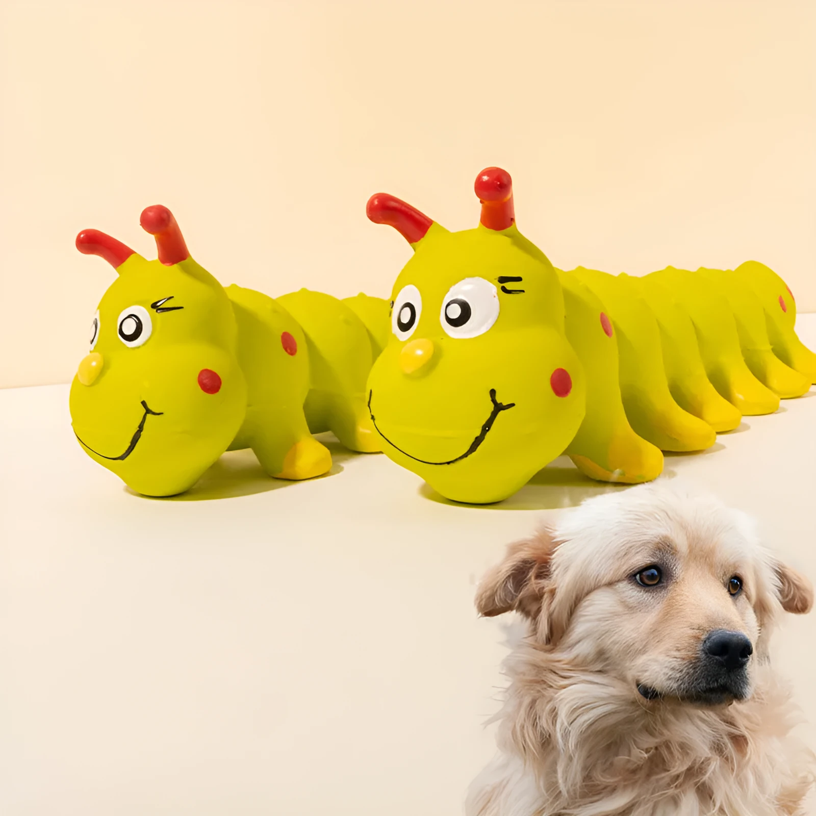 Yellow rubber caterpillar-shaped dog toy with squeaker measuring 25.5cm long