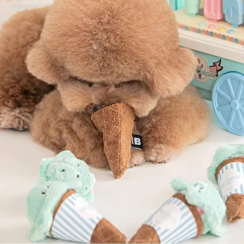 Fleece squeaky ice cream toy for dogs and cats in lake blue on a light background