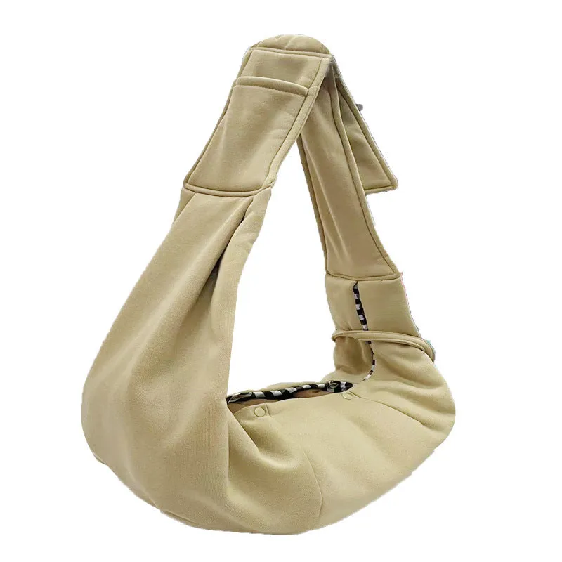 Soft polyester pet carrier bag with adjustable shoulder strap for small dogs under 7.5kg, shown in khaki colour.