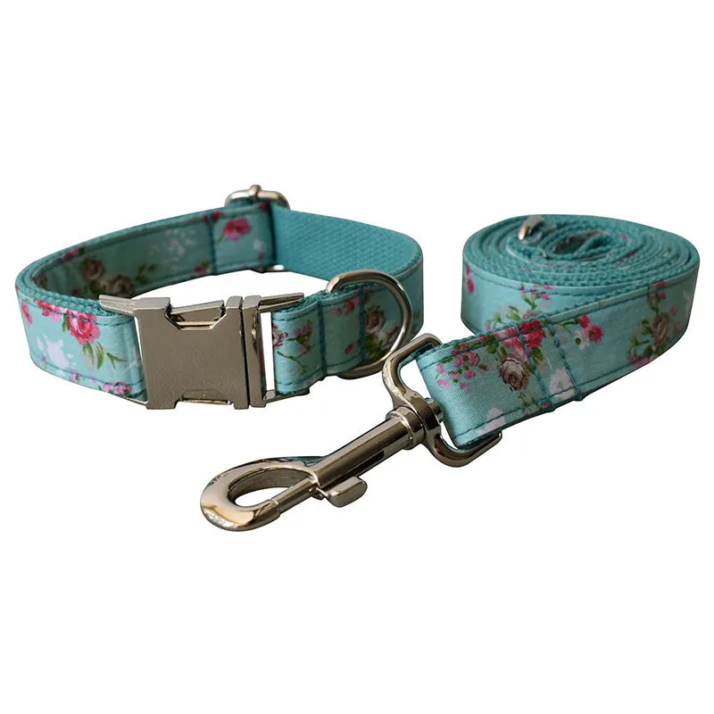 Green rose cotton dog collar and leash set with flower pattern on neutral background