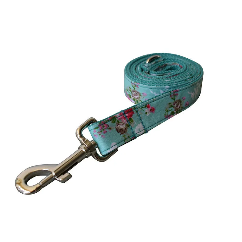 Green rose cotton dog collar and leash set with flower pattern on neutral background