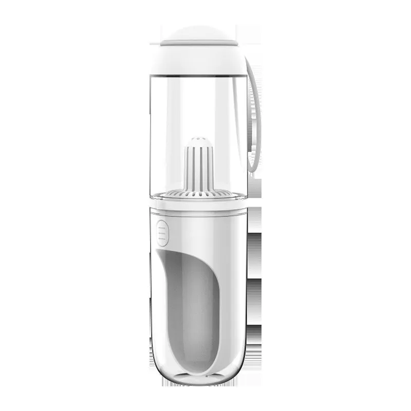 Blue pet travel cup 330ml with filter element next to a dog on a walk