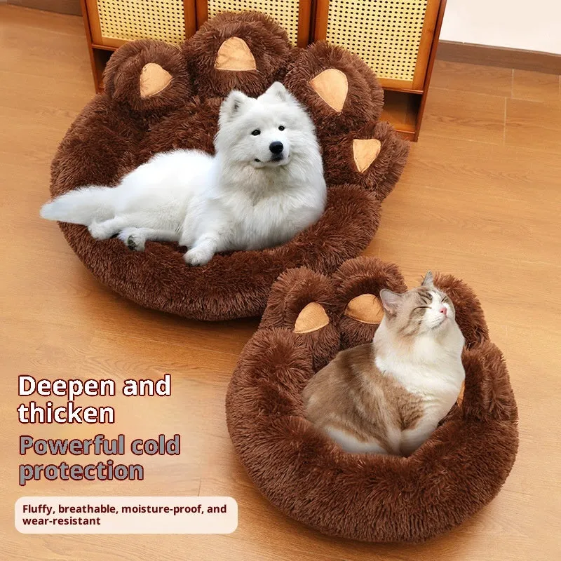 Round plush pet bed in coffee colour with raised rim and textured hand-shaped brush nest surface