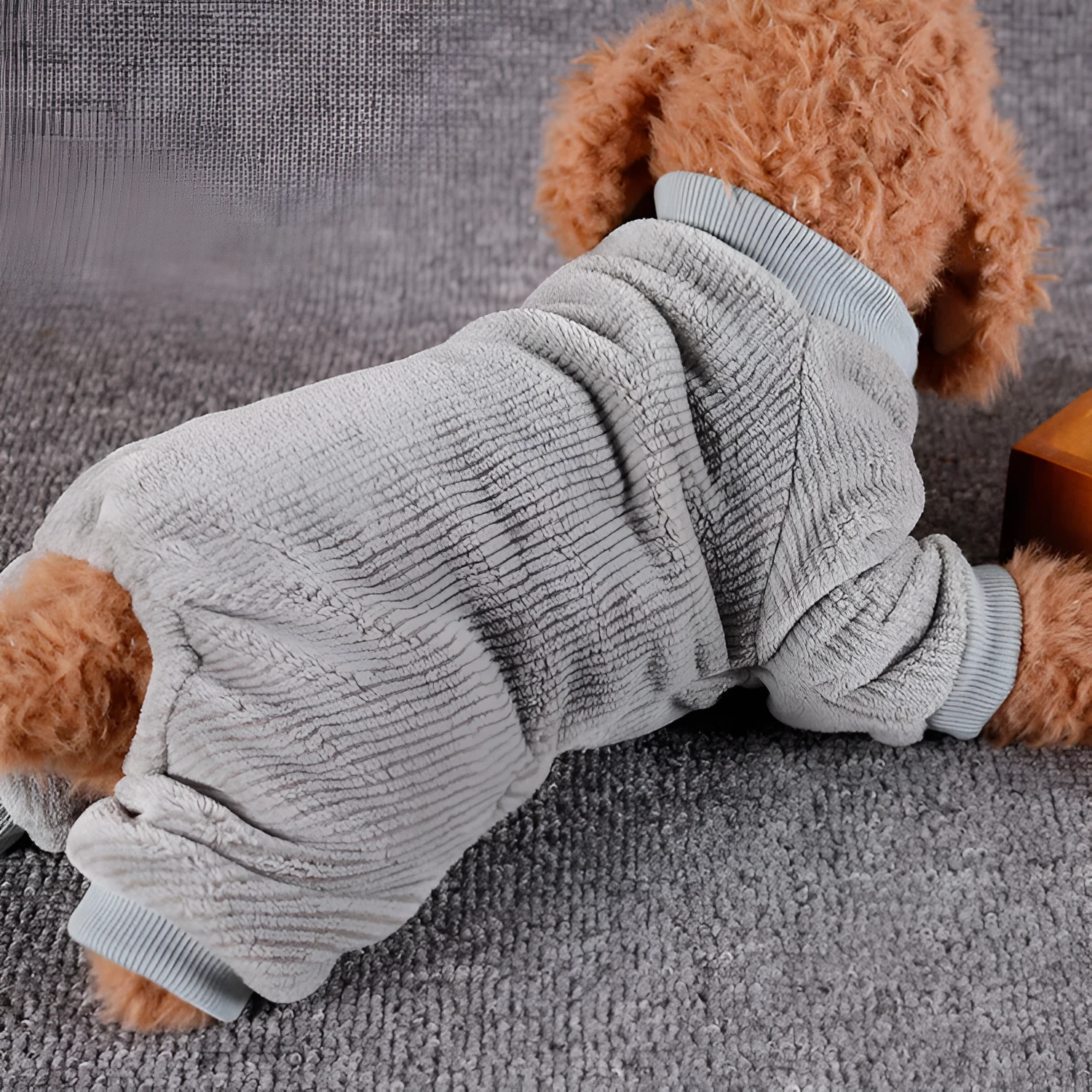 Blue flannel four-legged dog coat for medium size dog, front view on neutral background