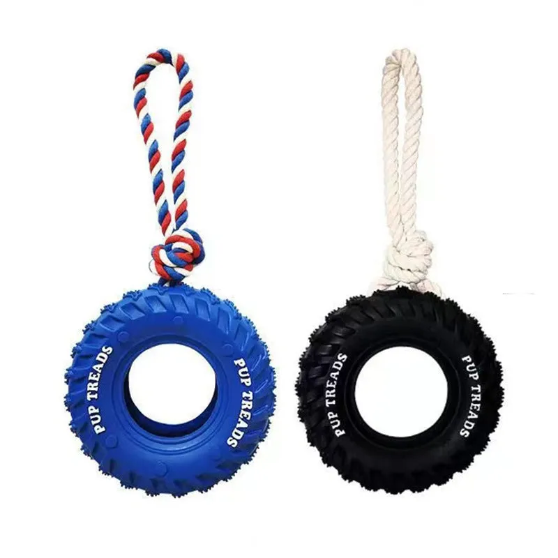 Tough natural rubber dog chew toy shaped like a tire with rope, black colour, for large dogs