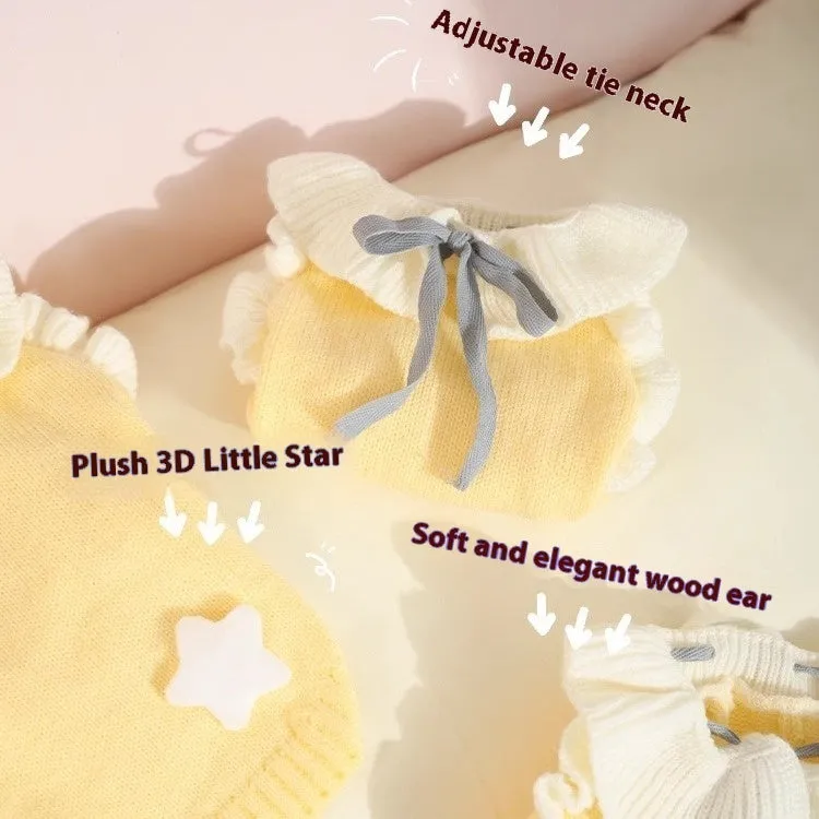 Yellow acrylic dog sweater on a small puppy, showing a casual knitted design.