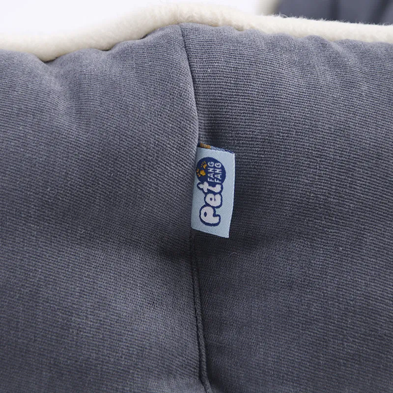 Blue memory foam pet cushion on floor with dog sitting on it, size L option shown