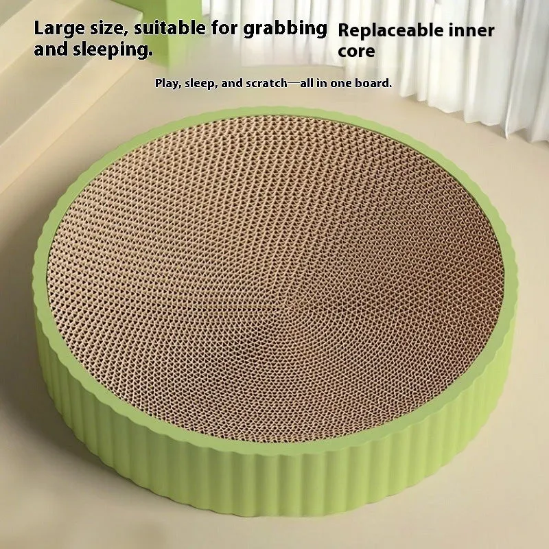 Round green cat scratching board with corrugated cardboard centre and two white replacement refills