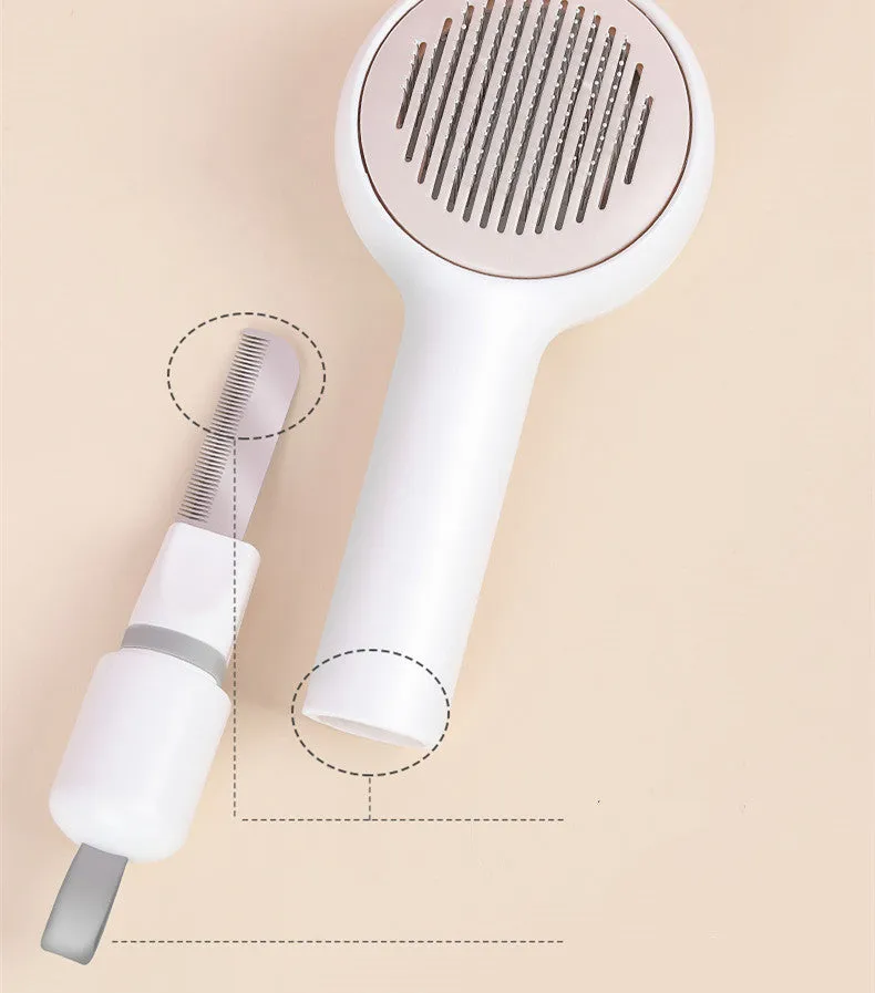 Pink cat combing brush floating needle comb for cats and dogs on white background